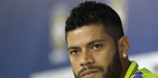 Brazil's Hulk listens to questions from the media during a news conference after a training session of the Brazilian national soccer team at the Granja Comary training center in Teresopolis, Brazil, Sunday, June 15, 2014. Brazil plays in group A of the 2014 soccer World Cup. (AP Photo/Andre Penner)