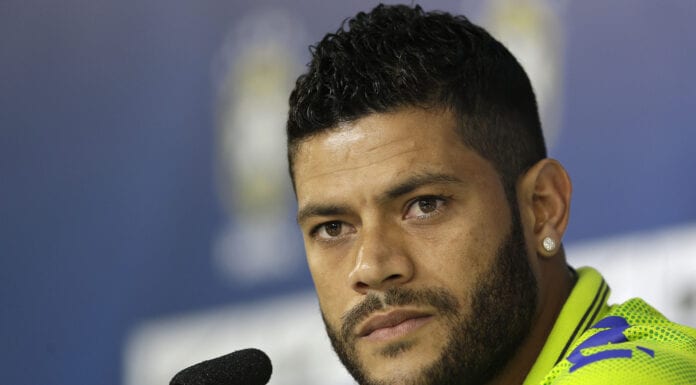 Brazil's Hulk listens to questions from the media during a news conference after a training session of the Brazilian national soccer team at the Granja Comary training center in Teresopolis, Brazil, Sunday, June 15, 2014. Brazil plays in group A of the 2014 soccer World Cup. (AP Photo/Andre Penner)